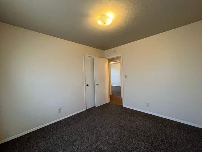 Building Photo - Sheridan Duplexes 01-03