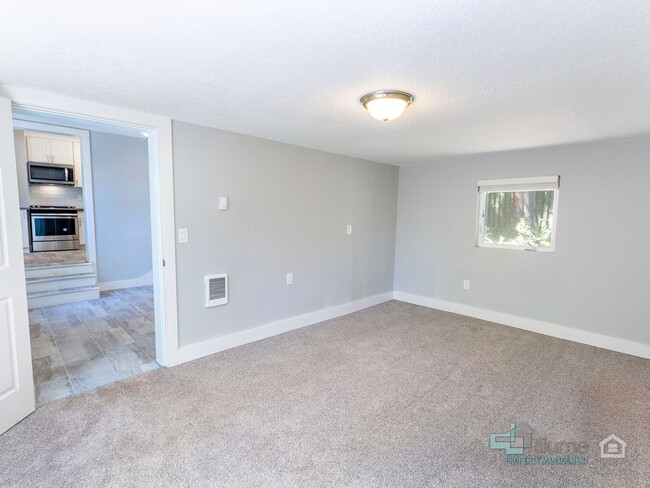 Building Photo - 3 Bedroom... Sweet Story-Book Mid-Century ...