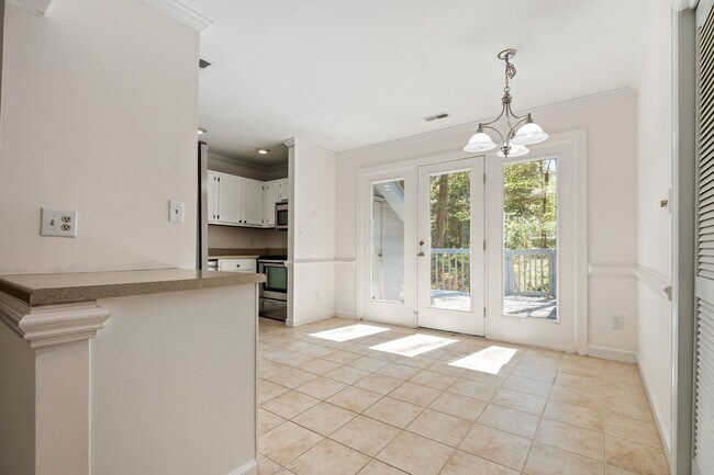 Building Photo - LOCATION!! Updated Townhome in Sought-After Durham Woodcroft neighborhood