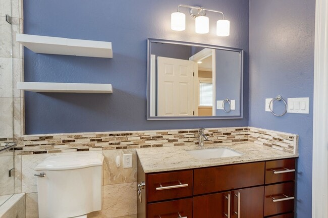 Building Photo - 4BR/3.5BA Belmont Home with Multiple Ensuite Bedrooms, A/C & 2-Car Garage | YouTube Tour