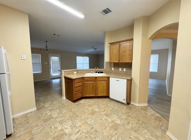 Building Photo - 12809 Wood Lily Tr