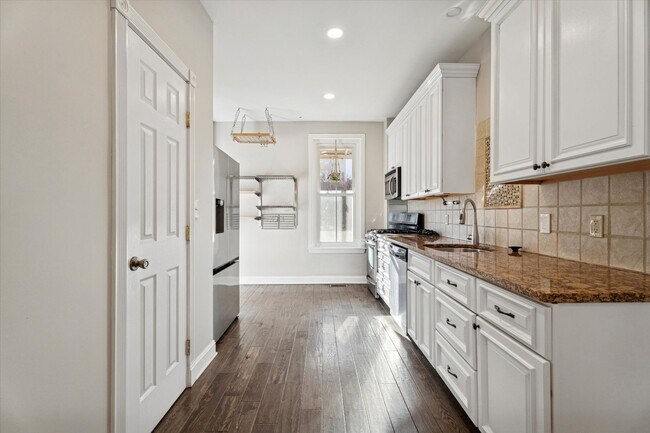 Building Photo - Stylish Phoenixville Rowhome with Exposed Brick, High Ceilings & Central Air