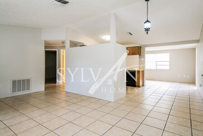 Building Photo - The living is easy in this 3 bedroom, 2 ba...