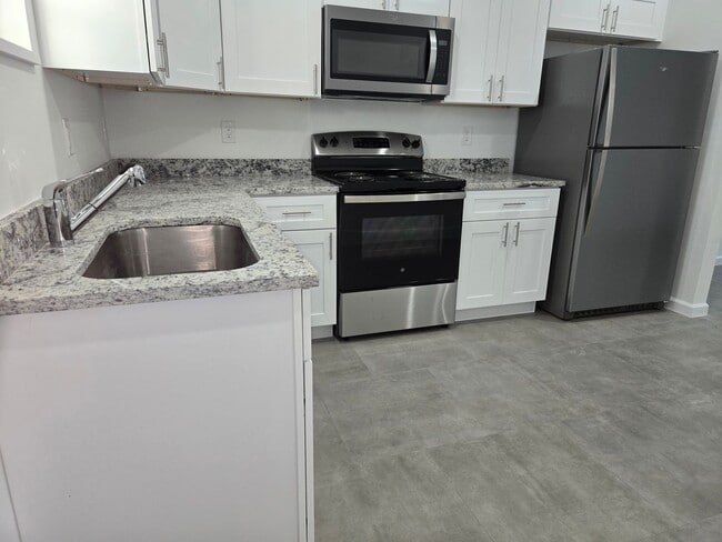 Building Photo - Brand-New 2/2/1 -SW Lehigh Acres-See this ...