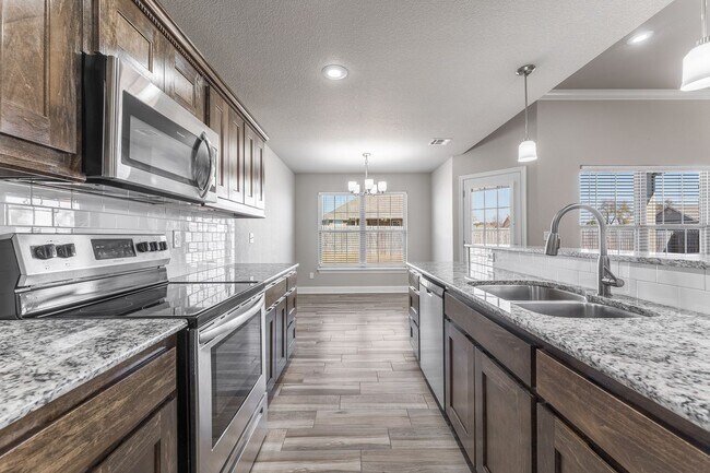 Building Photo - Spacious 4-Bedroom Home with Open Layout & Fenced Backyard in Pea Ridge