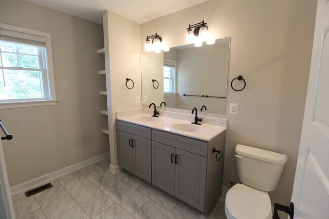 Building Photo - Spacious 4 Bedroom, 3.5 Bath Townhome with...