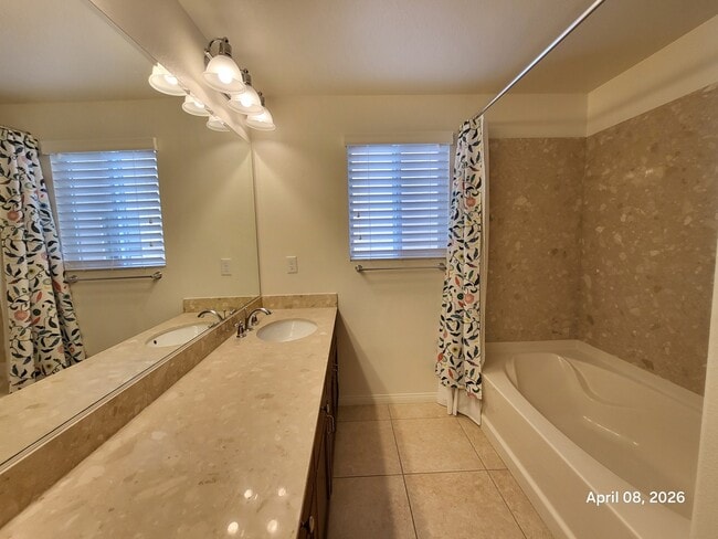 Building Photo - 5882 Azzura Palms Ave