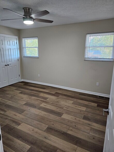 Two large bedrooms on the second floor with celiing fans and two closets in each room. - 2788 Blossom Ave