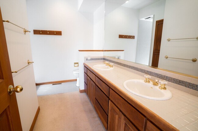 Building Photo - Private river access and stunning views from this home on Harmon Blvd! + Bonus Room