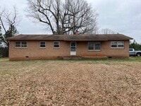 Building Photo - Just off Dave Lyle Blvd, close to shops and restaurants!