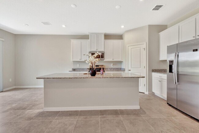 Building Photo - 12639 SW Forli Wy