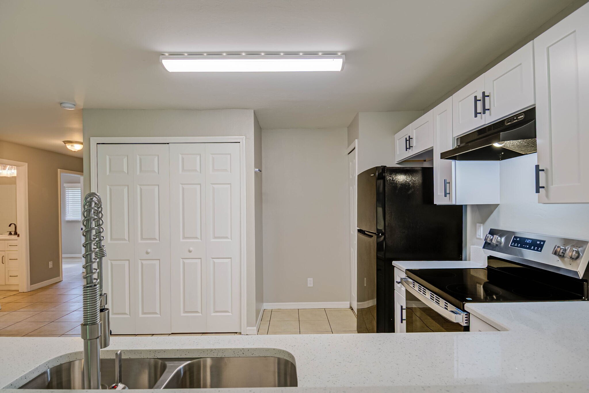 Kitchen with Laundry closet - 704 Ichabod Ave S
