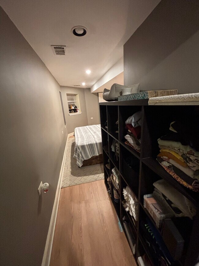 Hallway leading to walk in closet offers additional space for storage - 4871 N Magnolia Ave