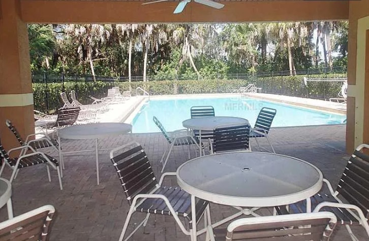 The community pool also has dining areas. Included with your lease. - 4408 Tuscan Loon Dr