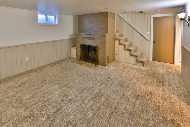 Downstairs family room with gas fireplace - 1020 E Garden Ave