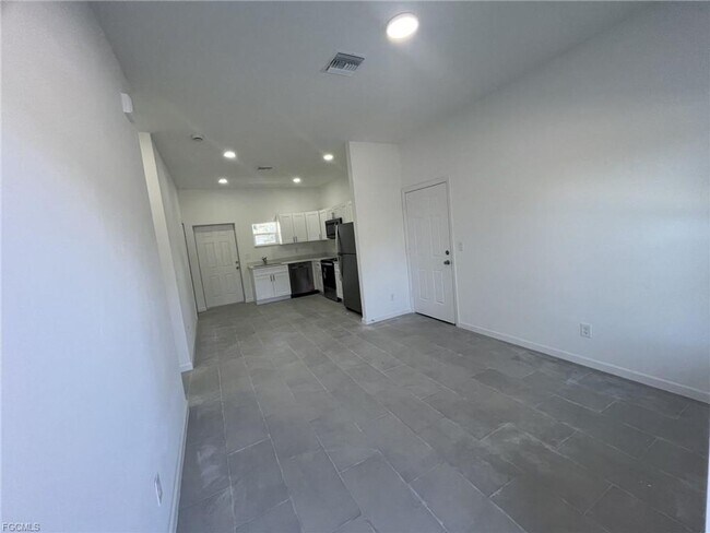 Building Photo - Brand new 2/1 -LARGE BACK YARD- LEHIGH ACRES