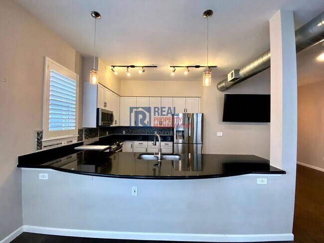 Building Photo - 1489 Steele St