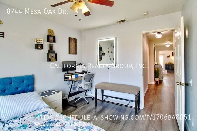 Building Photo - 8744 Mesa Oak Dr