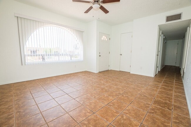 Building Photo - Charming Property Features 3 Bedrooms, 2 B...