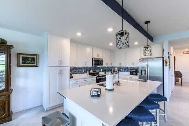 Building Photo - PET FRIENDLY- TURNKEY FURNISHED. VARIABLE RENTAL RATES