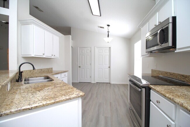 Building Photo - Coming March 14th — Stunning 4-Bed, 2-Bath Sunset Estates Home with Open-Concept Living, Chef’s K...