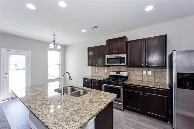 Building Photo - 6555 Woodwell Dr