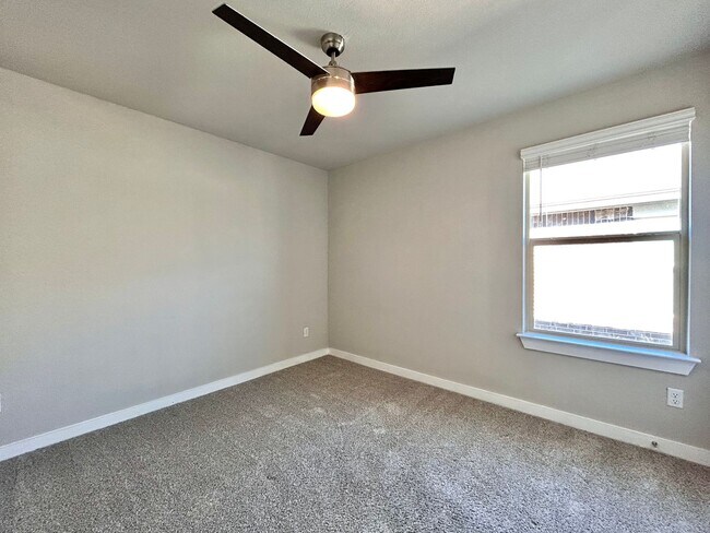 Building Photo - Move-In Ready Home with Open Layout & Outdoor Entertaining Space