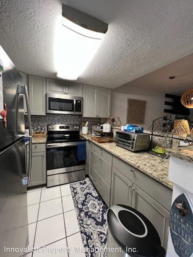 Building Photo - 2 br, 1 bath Apartment - 2 Bedroom 1 Bath ...