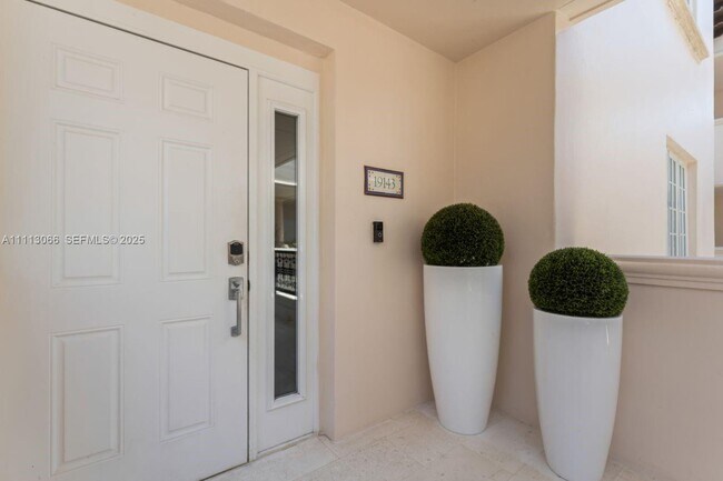 Building Photo - 19143 Fisher Island Dr