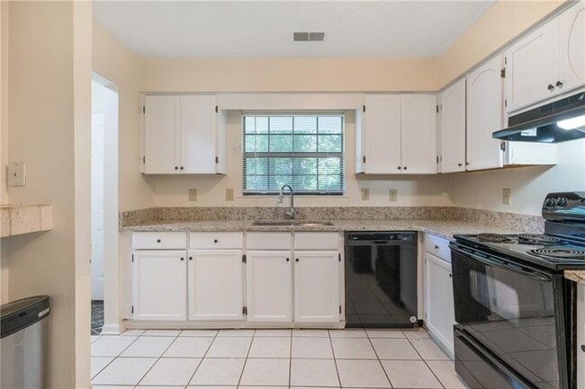 Building Photo - 5000 Village Green Way