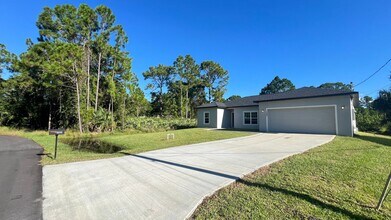 Building Photo - Stylish 3BR/2BA Palm Bay Home – No Water B...