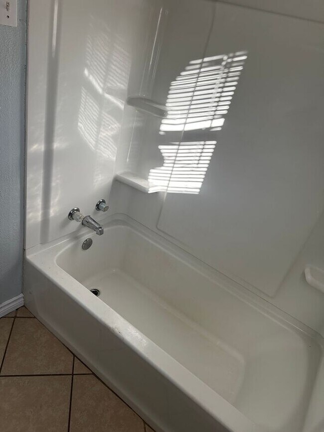 Building Photo - Come see this updated and spacious 3 bedro...