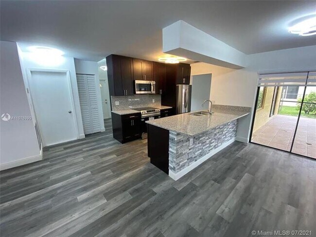 Building Photo - 9658 NW 28th Ct