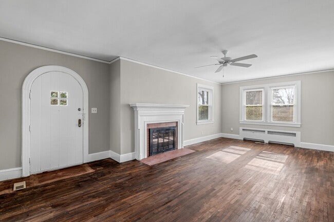 Building Photo - SW, Large Brick Two Bedroom PLUS Two Sun-Rooms, Hardwoods, LR & Separate DR, Fire Place!