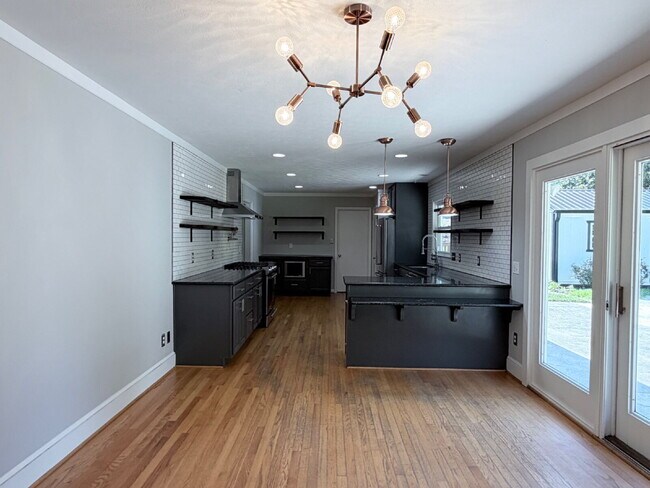 Building Photo - Updated 3BR Home in Beaver Lake | Fenced Yard, Garage, Covered Porch & Outdoor Fireplace | Pet Fr...