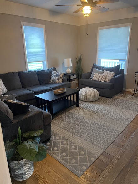 Large living room with comfy sectional and electric fireplace - 514 Bridge St