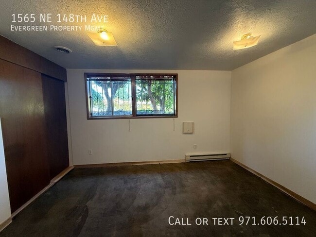Building Photo - 1565 NE 148th Ave