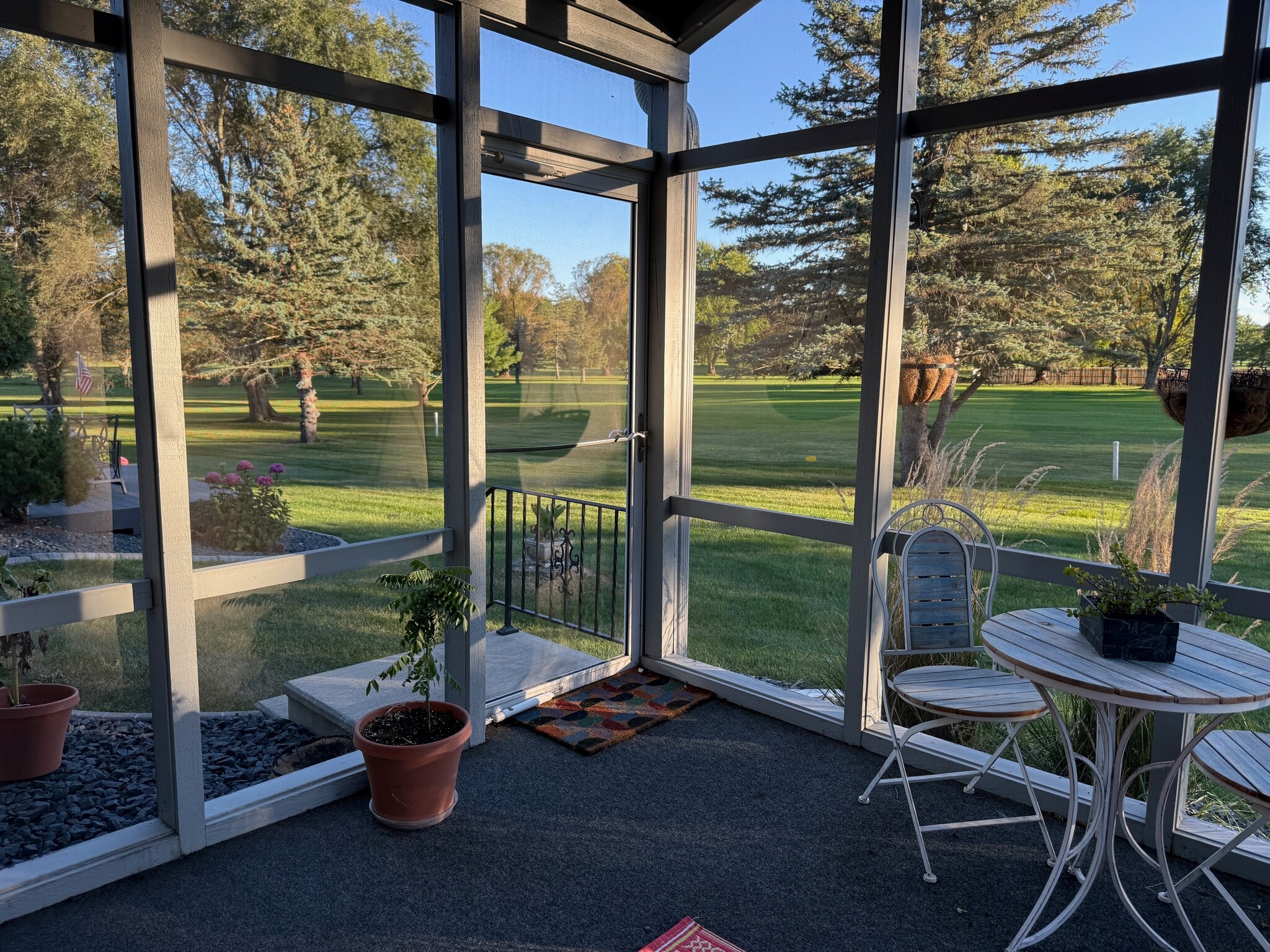 You can step out of the porch into the backyard continuous with the golf course - 4888 Tee Ct SW