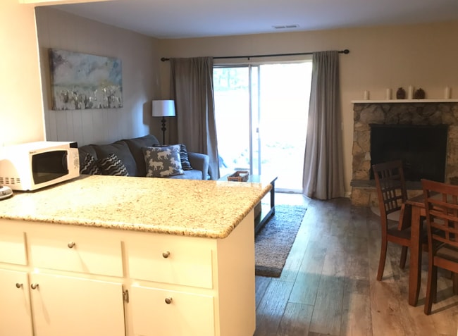 View from the kitchen, gas starting wood burning fireplace. Condo Not furnished, - 1410 Ski Run Blvd