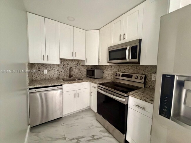 Building Photo - 488 NE 18th Ave