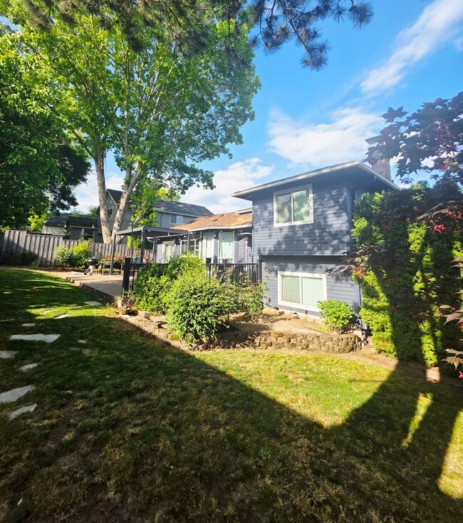 Building Photo - Charming 3 Bedroom Split-Level Home with Multiple Living Rooms & Spacious Back Yard
