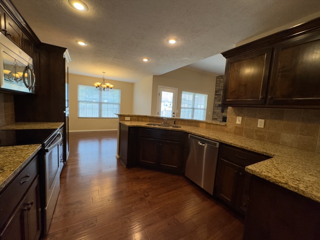 Building Photo - NEW 4 Bedroom | 2 Bathroom | 3 Car Garage ...