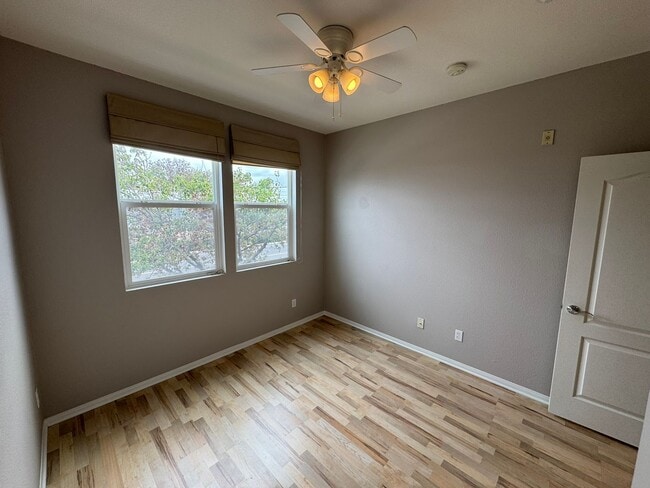 Building Photo - Sleek 3-Bed + Flex Corner Condo with Attached Tandem Garage
