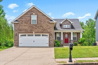 Building Photo - Pet Friendly Three Bedroom with Bonus!