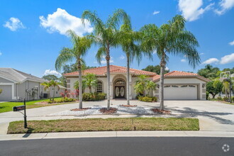 Building Photo - Stunning 5-Bedroom Pool Home in Gated Spyg...