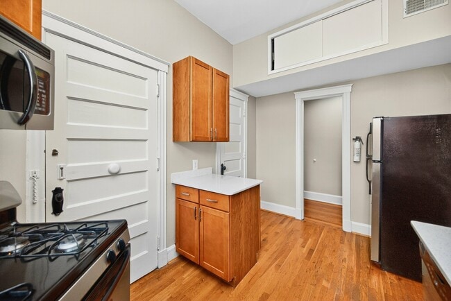 Flat 102 Kitchen - Clermont Condominiums
