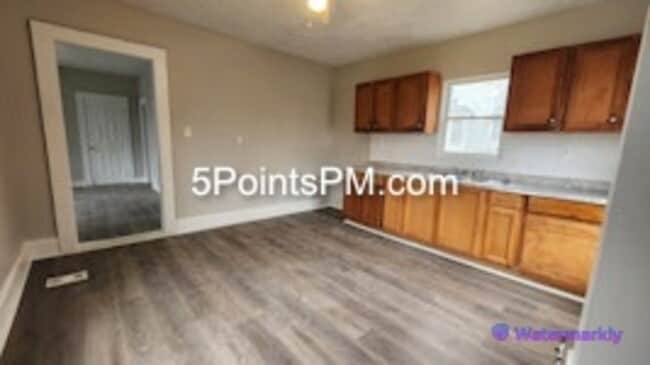 Building Photo - 9804 Miles Ave