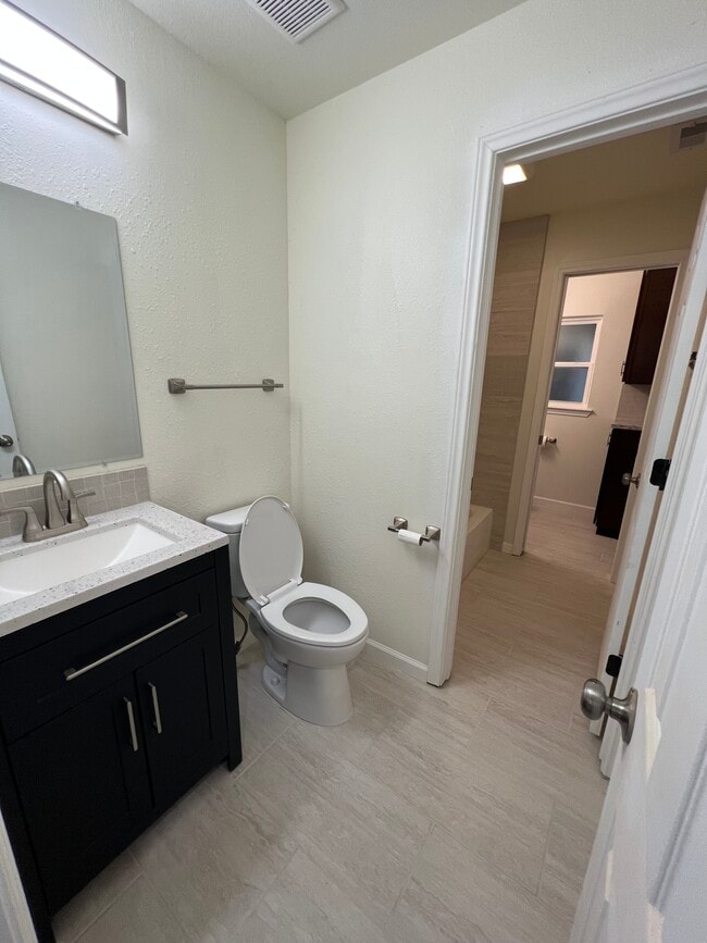 1-1/2 Bathroom tandem. View from first half bath. - 6015 Heffernan St