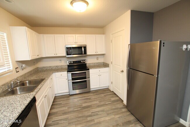 Building Photo - 322 E Bobcat Pl