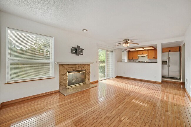 Building Photo - AVAILABLE NOW! 2BR/2BA Condo – Awesome Location! Glossy Hardwoods, Granite Countertops, W/S/G Inc...